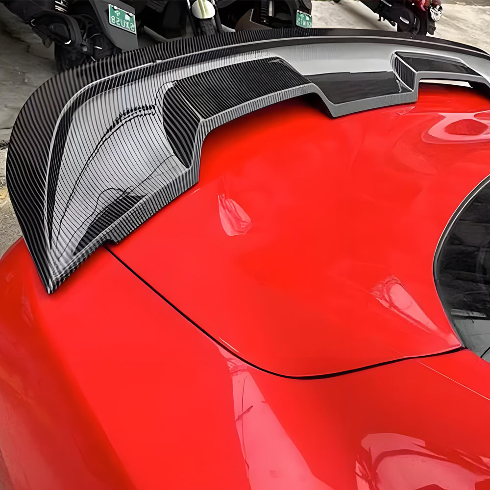 Display of Red Ford Mustang with Carbon Fiber-Look Rear Spoiler