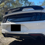 Display of White Ford Mustang with Carbon Fiber-Look Rear Spoiler